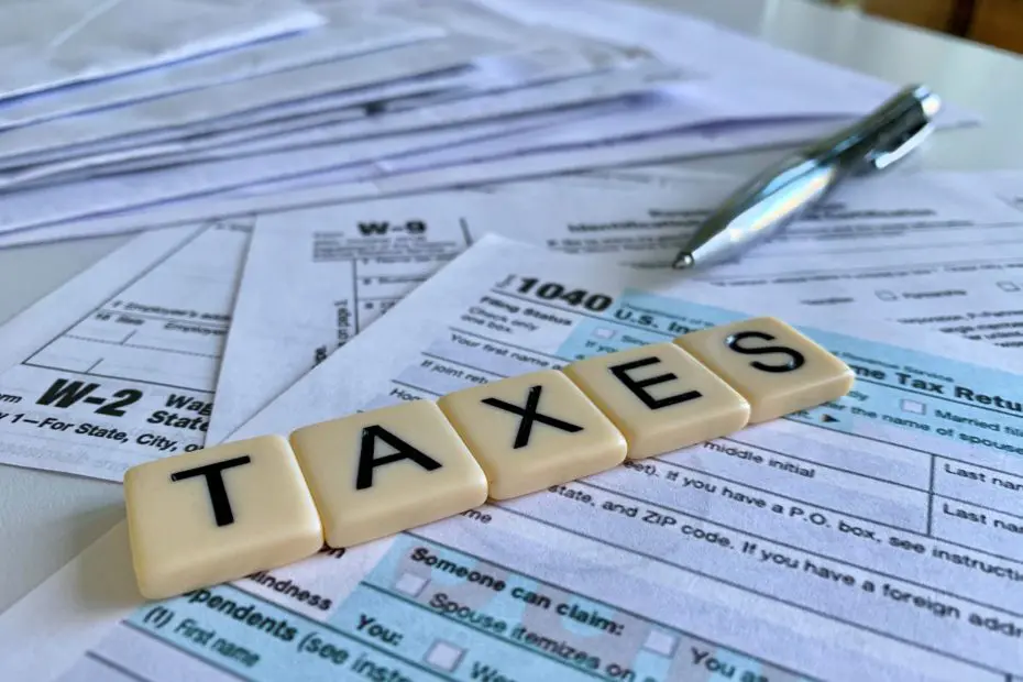 low-angle-of-letter-tiles-with-the-word-taxes-on-a-2021-09-01-13-23-54-utc