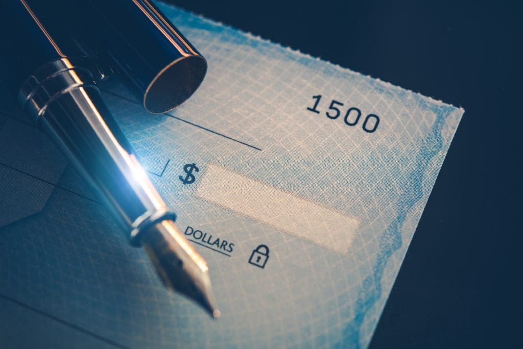 Business Check for employee as part of Payroll Services with Jennifer Young's Bookkeeping.